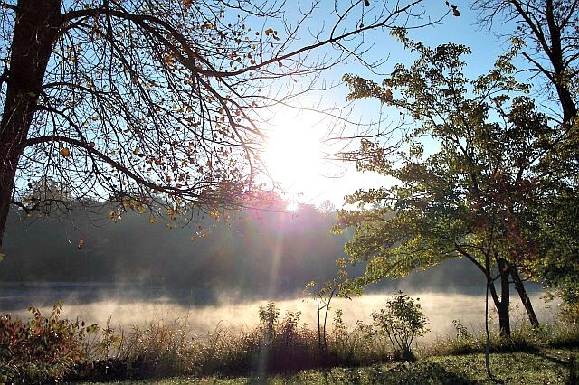 Fog on the Rock River. Riverside Park in Janesville, Wisconsin.